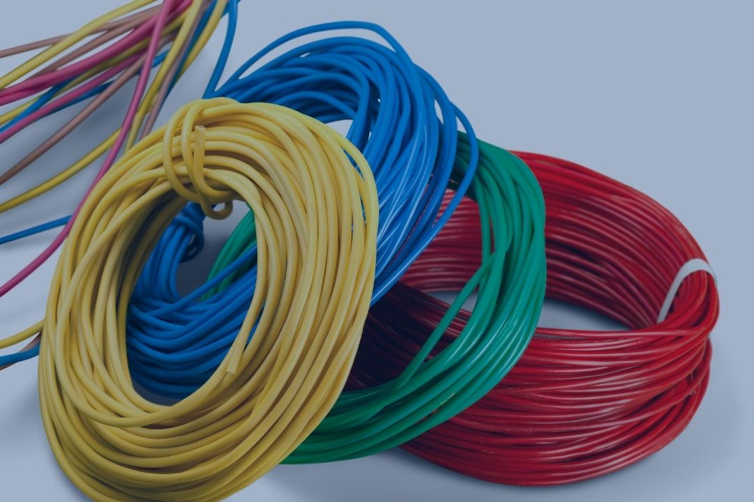 Rolls of different coloured cable