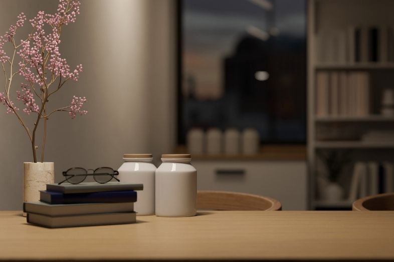 Wood dining table with copy space over blurred living room in the background