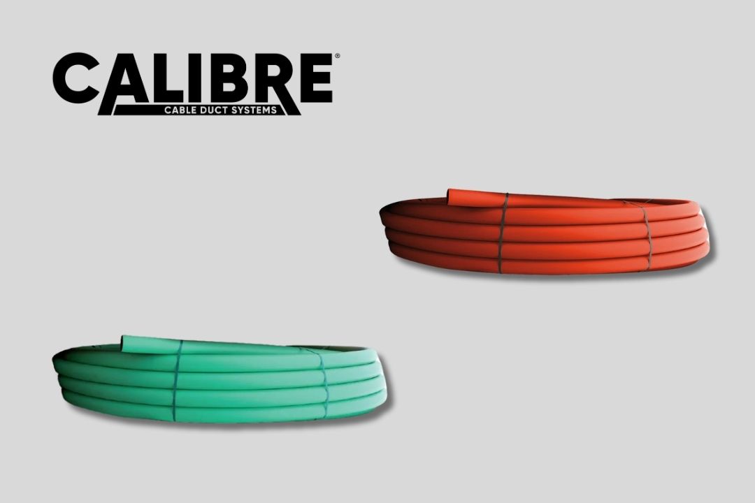 Red and green cable ducting on a grey background