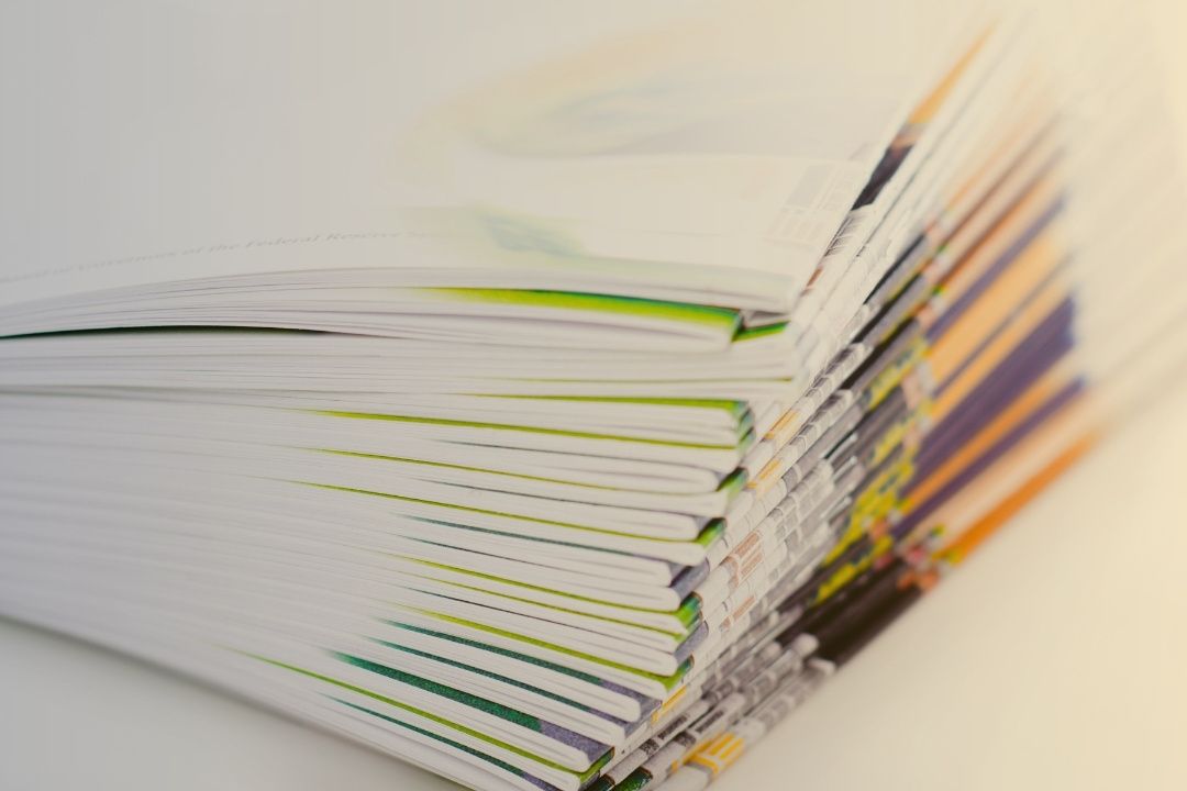 Stack of documents with coloured spines